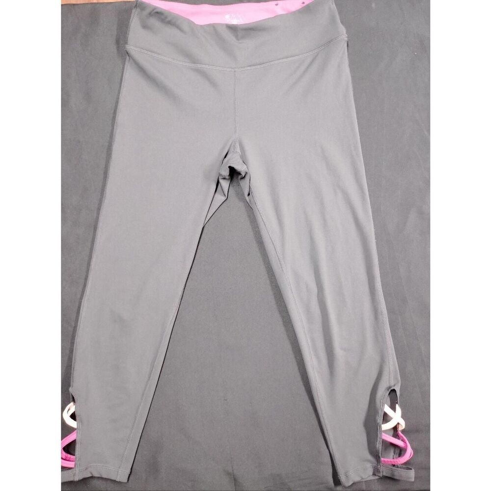 Gaiam Grey Capris With Pink and Yellow Criss Cross Strappy Leg Cutouts